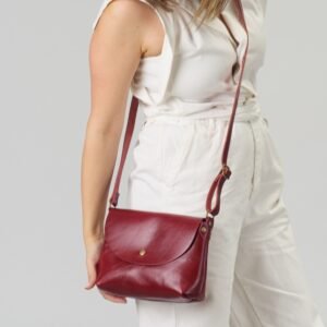 Handcrafted women’s leather handbag with flap closure red color