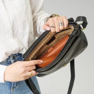 Large leather crossbody bag with a flap and zipper closure 2